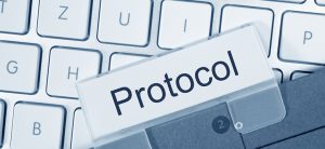A keyboard with the word protocol on it.