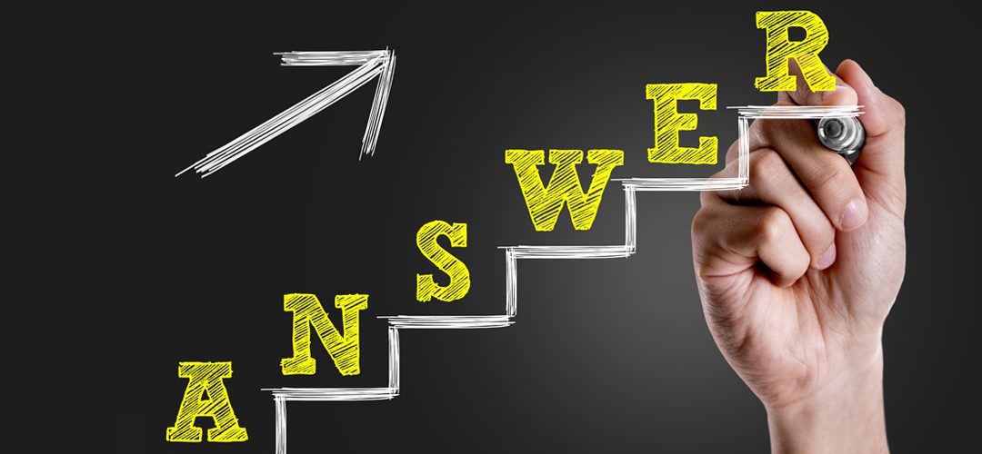 A man is looking at the word " answers ".