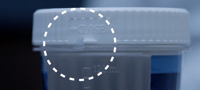 A close up of the circular logo on a box