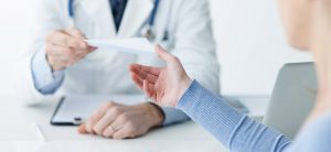 A person is holding their hand out to someone