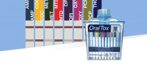 A bottle of oral tissues next to many different colors.