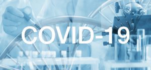 A close up of the words covid-1 9 written in white