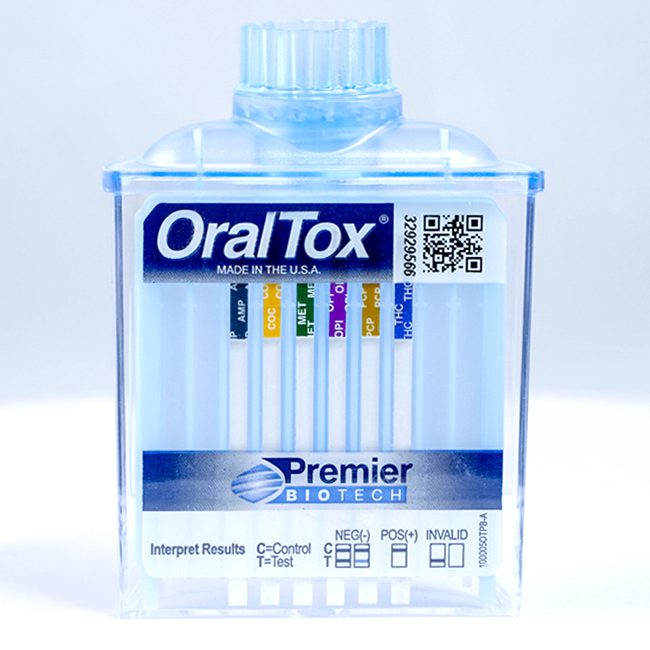 A bottle of dental floss with the name oraltox written on it.