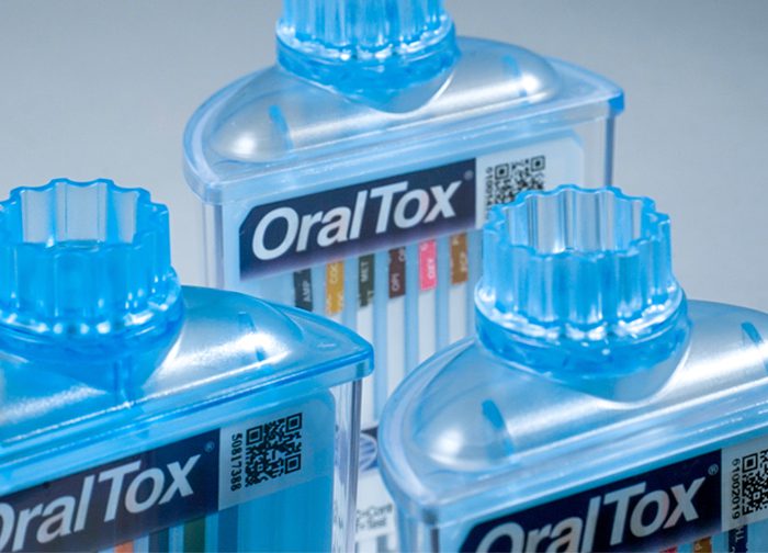 Three bottles of oral-b toothpaste are shown.