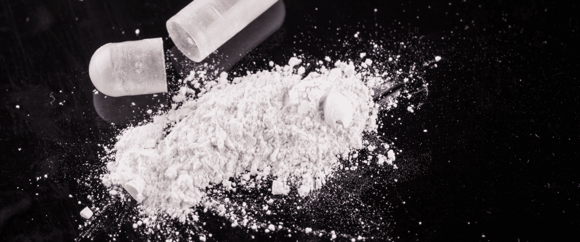 A pile of white powder sitting on top of a table.