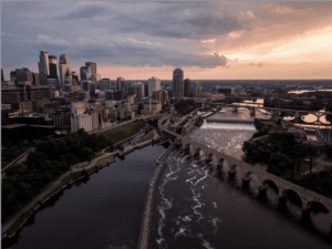 A view of the city from above at sunset.