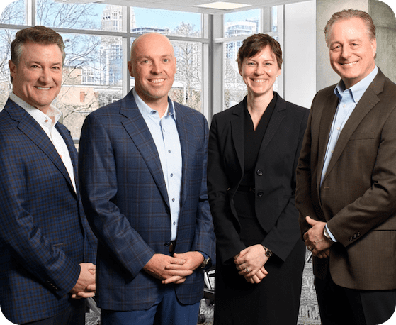 leadership team stood in a line side-by-side